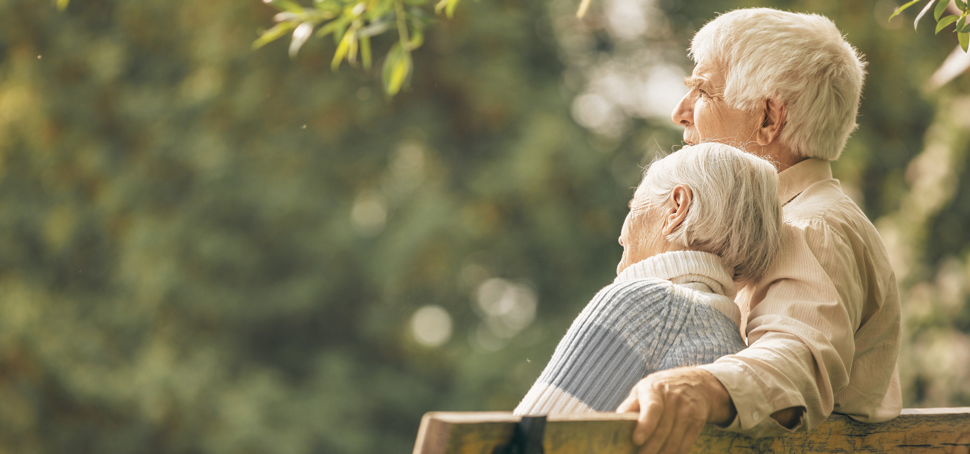 An older man sharing a warm embrace with a loved one